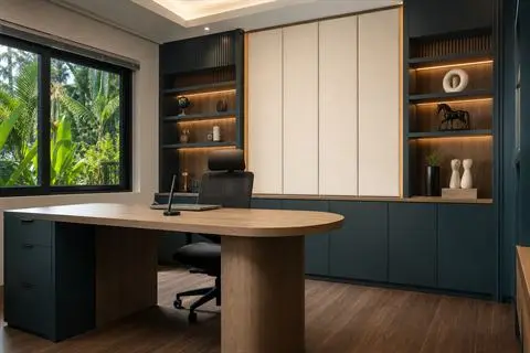 Custom home office with teal and oak built-in cabinetry